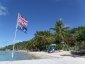 Flags at Machioneel Bay Cooper Island